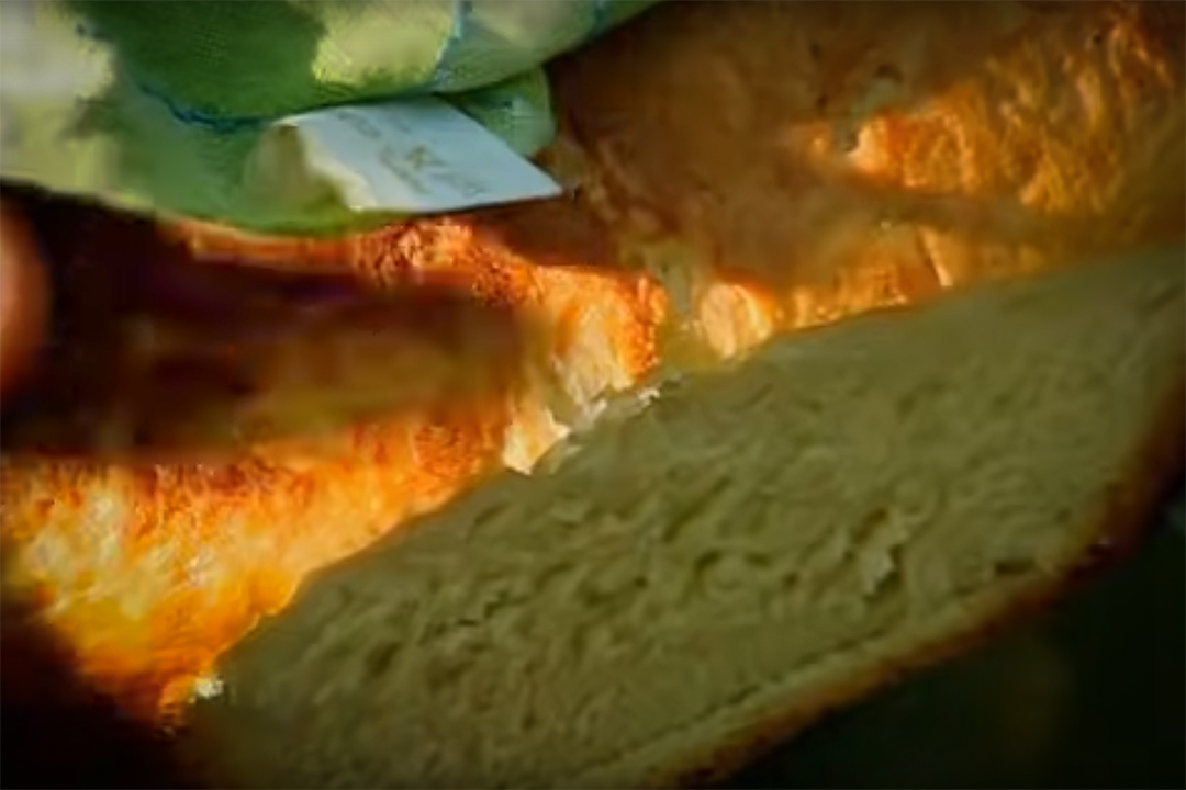 Freshly baked white bread, cooked on campfire